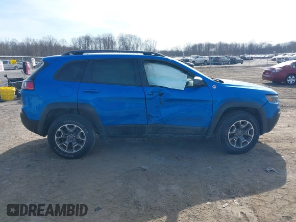 2021 Jeep Cherokee Trailhawk with VIN 1C4PJMBX4MD222987, listed as a IAAI auction lot 41771808 with 52,533 mi miles and . Bid and sale history available at DreamBid. Image 13.