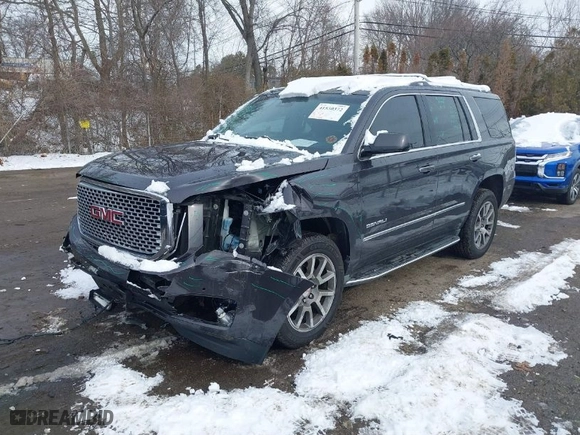 2016 GMC Yukon Denali with VIN 1GKS2CKJ5GR412709, listed as a IAAI auction lot 41530372 with 105,555 mi miles. Bid and sale history available at carsss.com. Image 2.