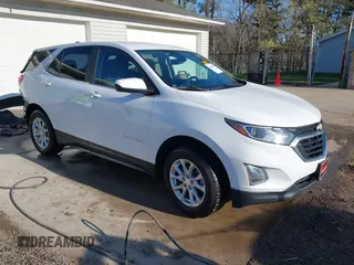 2021 Chevrolet Equinox LT z VIN 3GNAXUEV0MS128062, wystawiony jako IAAI lot #42044522 z przebiegiem 55 802 mil mil oraz . Historia ofert i sprzedaży dostępna na DreamBid. Obrazek 1.