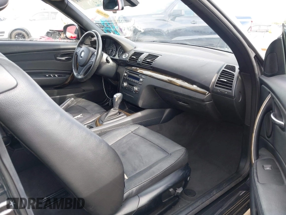2012 BMW 1 Series 128i с VIN WBAUN1C53CVR00251, выставлен на аукционе IAAI как лот 42164868 с пробегом 96 440 миль миль и . История ставок и продаж доступна на DreamBid. Изображение 5.