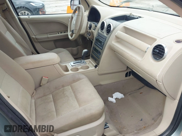 2006 Ford Freestyle SE z VIN 1FMZK01176GA10920, wystawiony jako IAAI lot #41509523 z przebiegiem 248 318 mil mil oraz . Historia ofert i sprzedaży dostępna na DreamBid. Obrazek 5.