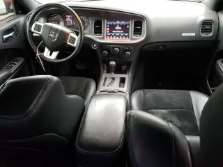 2013 Dodge Charger RT Plus with VIN 2C3CDXCT1DH593678, listed as a Copart auction lot 57032534 with 132,511 mi miles and Salvage Title. Bid and sale history available at carsss.com. Image 8.