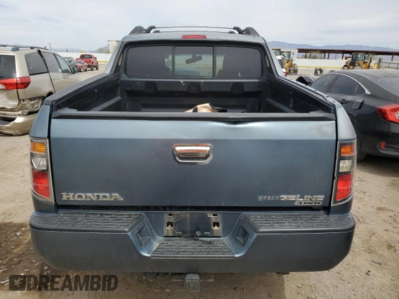 2006 Honda Ridgeline RTL with VIN 2HJYK16556H524959, listed as a Copart auction lot 50733285 with 134,389 mi miles and Salvage Title. Bid and sale history available at carsss.com. Image 6.