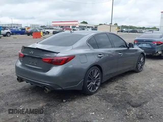 2021 Infiniti Q50 Red Sport 400 with VIN JN1FV7DR2MM880505, listed as a IAAI auction lot 42377058 with 59,618 mi miles and . Bid and sale history available at DreamBid. Image 4.