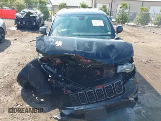 2018 Jeep Grand Cherokee Trailhawk with VIN 1C4RJFLG4JC241057, listed as a IAAI auction lot 42416590 with 81,822 mi miles and . Bid and sale history available at DreamBid. Image 12.