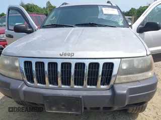 2003 Jeep Grand Cherokee Laredo with VIN 1J4GW48S83C558962, listed as a IAAI auction lot 42415803 with 312,419 mi miles and . Bid and sale history available at DreamBid. Image 6.
