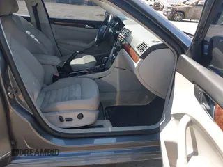 2013 Volkswagen Passat SEL Premium with VIN 1VWCM7A34DC055684, listed as a IAAI auction lot 42039636 with 167,746 mi miles. Bid and sale history available at carsss.com. Image 5.