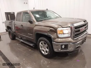 2014 GMC Sierra 1500 SLT with VIN 1GTV2VEC9EZ153530, listed as a IAAI auction lot 41647250 with 124,171 mi miles. Bid and sale history available at carsss.com. Image 1.