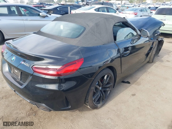 2022 BMW Z4 sDriveM40i with VIN WBAHF9C08NWX88691, listed as a IAAI auction lot 40983519 with 11,108 mi miles. Bid and sale history available at carsss.com. Image 4.