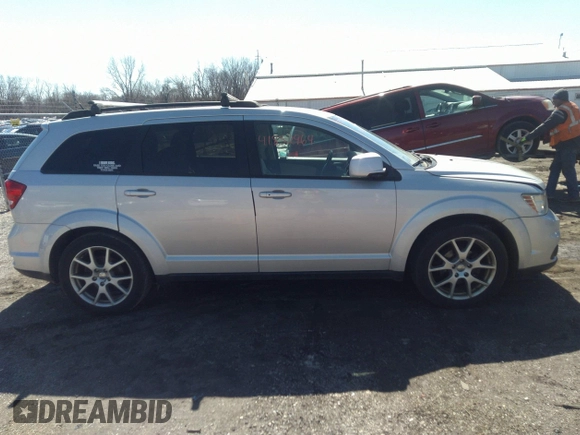 2011 Dodge Journey Mainstreet with VIN 3D4PG1FG5BT540585, listed as a IAAI auction lot 41852964 with 156,941 mi miles and . Bid and sale history available at carsss.com. Image 13.