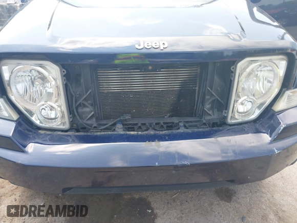 2012 Jeep Liberty Sport with VIN 1C4PJMAK4CW197081, listed as a IAAI auction lot 42511559 with 126,558 mi miles and . Bid and sale history available at DreamBid. Image 6.