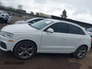 2016 Audi Q3 Premium Plus with VIN WA1BFCFS0GR009654, listed as a IAAI auction lot 42141372 with 138,992 mi miles. Bid and sale history available at carsss.com. Image 14.