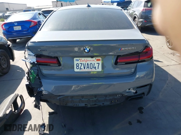 2022 BMW 5 Series M550i xDrive with VIN WBA13BK02NCJ61943, listed as a IAAI auction lot 41607980 with Not provided miles and . Bid and sale history available at DreamBid. Image 17.