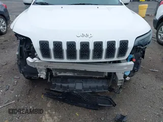 2020 Jeep Cherokee Latitude Plus z VIN 1C4PJMLBXLD538959, wystawiony jako IAAI lot #42266458 z przebiegiem 67 543 mil mil oraz . Historia ofert i sprzedaży dostępna na DreamBid. Obrazek 6.
