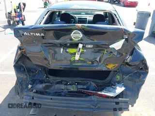 2015 Nissan Altima S with VIN 1N4AL3APXFC267944, listed as a IAAI auction lot 41890087 with 265,504 mi miles and . Bid and sale history available at DreamBid. Image 6.
