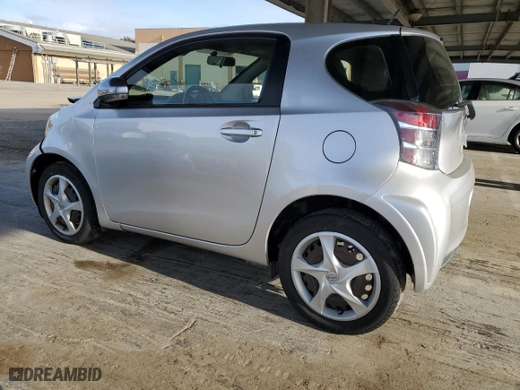 2015 Scion iQ with VIN JTNJJXB01FJ030680, listed as a Copart auction lot 46949235 with 27,509 mi miles and Salvage Title. Bid and sale history available at carsss.com. Image 2.