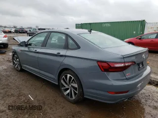 2021 Volkswagen Jetta GLI S z VIN 3VW6T7BU1MM017433, wystawiony jako Copart lot #73349822 z przebiegiem 7188 mil mil oraz . Historia ofert i sprzedaży dostępna na DreamBid. Obrazek 2.