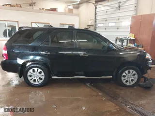 2003 Acura MDX Touring Pkg RES w/Navigation System with VIN 2HNYD18923H530593, listed as a IAAI auction lot 41639529 with 274,939 mi miles. Bid and sale history available at carsss.com. Image 14.