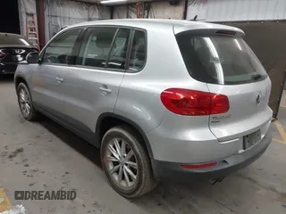 2017 Volkswagen Tiguan S with VIN WVGBV7AX6HK042814, listed as a IAAI auction lot 41742587 with 89,086 mi miles and . Bid and sale history available at DreamBid. Image 3.