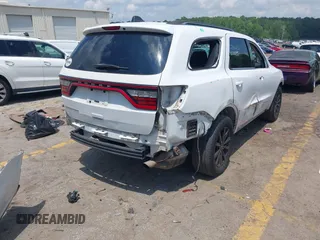 2015 Dodge Durango SXT with VIN 1C4RDHAG6FC145573, listed as a IAAI auction lot 42300420 with 134,684 mi miles and . Bid and sale history available at DreamBid. Image 4.