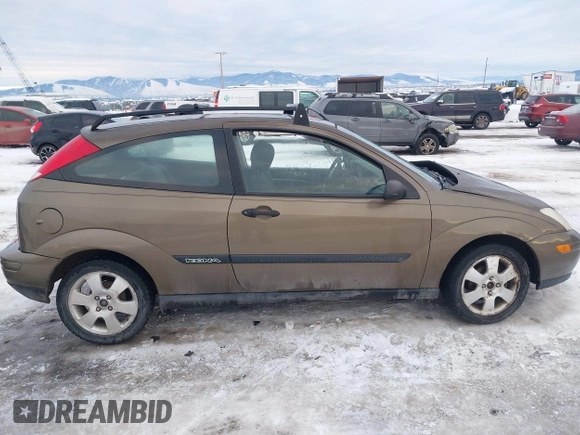 2000 Ford Focus ZX3 with VIN 3FAFP3137YR246156, listed as a IAAI auction lot 41330476 with 209,212 mi miles and . Bid and sale history available at DreamBid. Image 13.