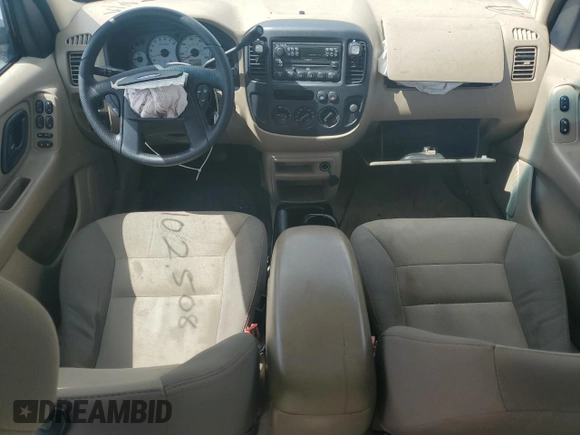 2004 Ford Escape with VIN 1FMCU02184KB21677, listed as a Copart auction lot 58401445 with 102,508 mi miles and Salvage title. Bid and sale history available at DreamBid. Image 8.