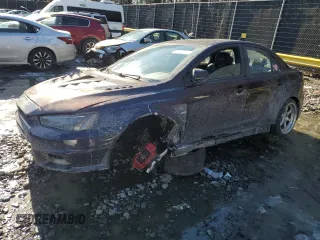 2014 Mitsubishi Lancer Evolution GSR with VIN JA32W8FV6EU010233, listed as a Copart auction lot 42787275 with 74,780 mi miles and Salvage Title. Bid and sale history available at carsss.com. Image 1.