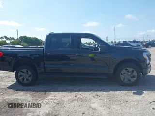 2024 Ford F-150 Lightning XLT with VIN 1FTVW3LK8RWG20320, listed as a IAAI auction lot 41960103 with Not provided miles and . Bid and sale history available at DreamBid. Image 12.