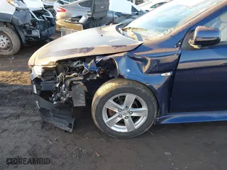 2013 Mitsubishi Lancer SE with VIN JA32V2FW0DU001146, listed as a IAAI auction lot 41771042 with 71,288 mi miles. Bid and sale history available at carsss.com. Image 6.