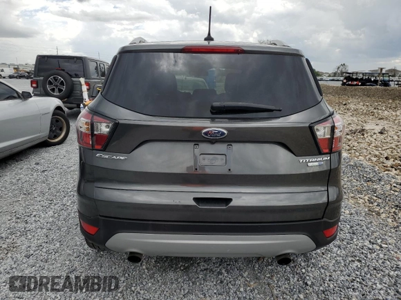 2018 Ford Escape Titanium with VIN 1FMCU9J90JUA75550, listed as a Copart auction lot 63339315 with Not provided miles and Clean title. Bid and sale history available at DreamBid. Image 6.