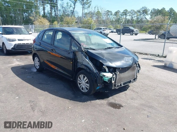 2016 Honda Fit LX with VIN JHMGK5H57GS010902, listed as a IAAI auction lot 41902395 with 124,531 mi miles. Bid and sale history available at carsss.com. Image 1.