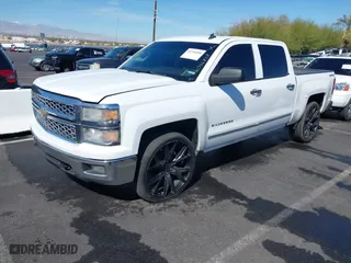 2014 Chevrolet Silverado 1500 LT with VIN 3GCUKRECXEG548397, listed as a IAAI auction lot 41746858 with 215,490 mi miles. Bid and sale history available at carsss.com. Image 17.
