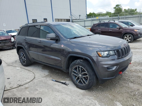2017 Jeep Grand Cherokee Trailhawk with VIN 1C4RJFLG1HC821666, listed as a Copart auction lot 58711535 with 109,578 mi miles and Salvage title. Bid and sale history available at DreamBid. Image 4.