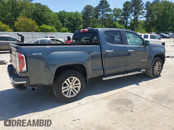 2015 GMC Canyon 4WD SLT z VIN 1GTG6CE30F1182562, wystawiony jako Copart lot #55382605 z przebiegiem 97 183 mil mil oraz Szkoda całkowita • Salvage title. Historia ofert i sprzedaży dostępna na DreamBid. Obrazek 3.