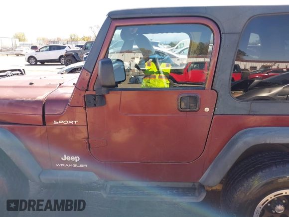 2003 Jeep Wrangler Sport with VIN 1J4FA49S33P345192, listed as a IAAI auction lot 41801344 with 196,472 mi miles. Bid and sale history available at carsss.com. Image 14.