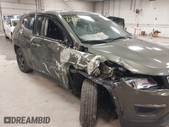 2020 Jeep Compass Sport with VIN 3C4NJDAB7LT132688, listed as a IAAI auction lot 41262430 with 91,167 mi miles and . Bid and sale history available at DreamBid. Image 6.