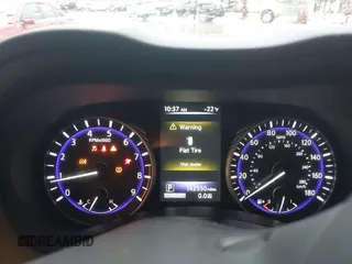 2014 Infiniti Q50 Premium z VIN JN1BV7AR7EM696486, wystawiony jako IAAI lot #41976047 z przebiegiem 145 000 mil mil oraz . Historia ofert i sprzedaży dostępna na DreamBid. Obrazek 14.