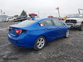 2016 Chevrolet Cruze Premier with VIN 3G1BG5SM1GS600104, listed as a IAAI auction lot 41311900 with 64,676 mi miles. Bid and sale history available at carsss.com. Image 4.