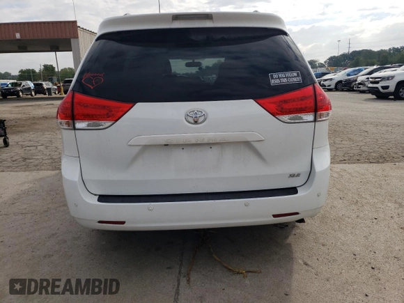 2012 Toyota Sienna XLE AAS with VIN 5TDYK3DC0CS250830, listed as a Copart auction lot 73323284 with 147,580 mi miles and Salvage Title. Bid and sale history available at DreamBid. Image 6.