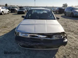 1991 Toyota Camry z VIN 4T1SV24E1MU369875, wystawiony jako Copart lot #79859504 z przebiegiem 138 718 mil mil oraz Szkoda całkowita • Salvage title. Historia ofert i sprzedaży dostępna na DreamBid. Obrazek 5.