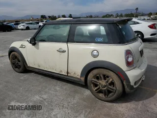 2013 MINI Hardtop S with VIN WMWSV3C51DT394368, listed as a Copart auction lot 57654475 with 86,136 mi miles and Clean Title. Bid and sale history available at DreamBid. Image 2.