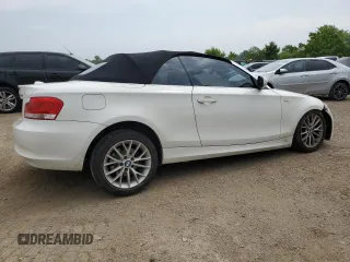 2012 BMW 1 Series 128i with VIN WBAUL7C52CVE87413, listed as a Copart auction lot 60557095 with 148,311 mi miles and Clean title. Bid and sale history available at DreamBid. Image 3.