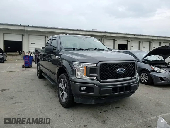 2019 Ford F-150 XL with VIN 1FTEX1EP9KKC47098, listed as a Copart auction lot 60653275 with 104,823 mi miles and Salvage title. Bid and sale history available at DreamBid. Image 13.