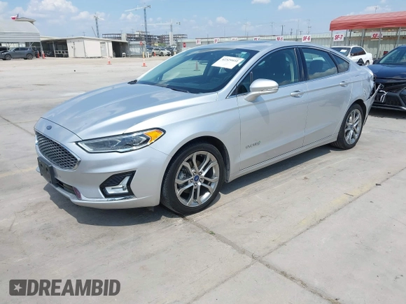 2019 Ford Fusion Titanium with VIN 3FA6P0RUXKR106430, listed as a IAAI auction lot 42329931 with 73,259 mi miles and . Bid and sale history available at DreamBid. Image 2.