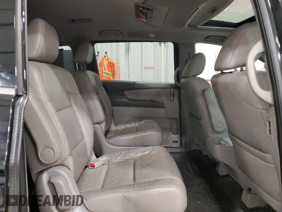 2011 Honda Odyssey Touring with VIN 5FNRL5H98BB027997, listed as a Copart auction lot 63239175 with 282,123 mi miles and Clean title. Bid and sale history available at DreamBid. Image 11.