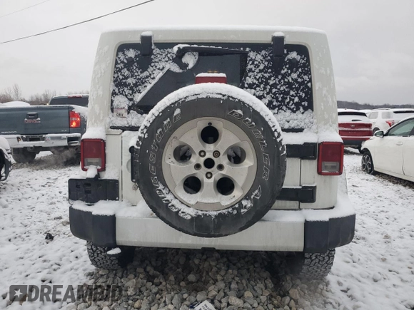 2014 Jeep Wrangler Sahara with VIN 1C4AJWBG5EL327823, listed as a Copart auction lot 85472404 with 136,132 mi miles and Clean Title. Bid and sale history available at DreamBid. Image 6.