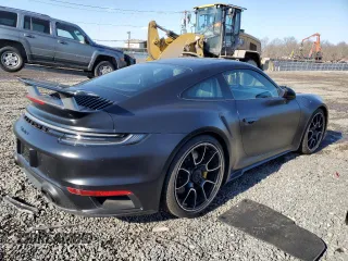 2021 Porsche 911 Turbo S with VIN WP0AD2A94MS258095, listed as a Copart auction lot 43157565 with 1,513 mi miles and Salvage Title. Bid and sale history available at DreamBid. Image 3.