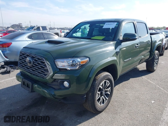 2021 Toyota Tacoma SR z VIN 3TMCZ5AN7MM395940, wystawiony jako IAAI lot #41860127 z przebiegiem 39 338 mil mil oraz . Historia ofert i sprzedaży dostępna na DreamBid. Obrazek 17.