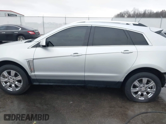 2016 Cadillac SRX Luxury Collection with VIN 3GYFNBE39GS550952, listed as a IAAI auction lot 40921325 with 90,160 mi miles. Bid and sale history available at carsss.com. Image 14.