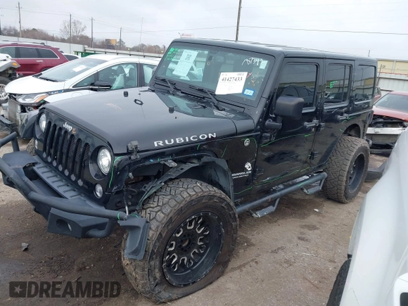 2017 Jeep Wrangler Unlimited Rubicon Recon z VIN 1C4HJWFG9HL592824, wystawiony jako IAAI lot #41427433 z przebiegiem 70 105 mil mil oraz . Historia ofert i sprzedaży dostępna na DreamBid. Obrazek 2.